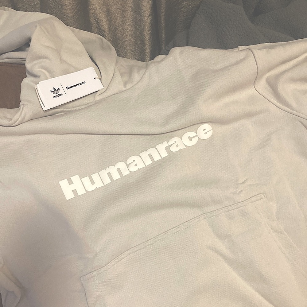 Human Race by Pharrell for Adidas. Gender neutral- aluminum size L- brand NWT